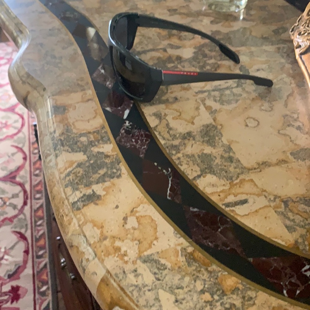 Gorgeous gently used Prada Sunglasses.